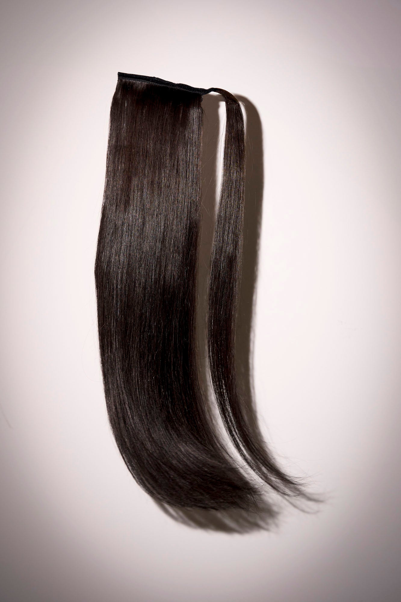 Glossy noir black ponytail made from 100% virgin human hair by 1010 Extensions
