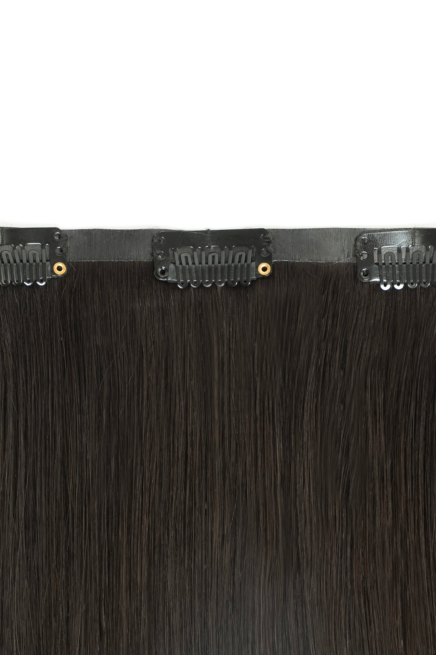 Natural black clip-in hair extensions for realistic volume and texture by 1010 Extensions