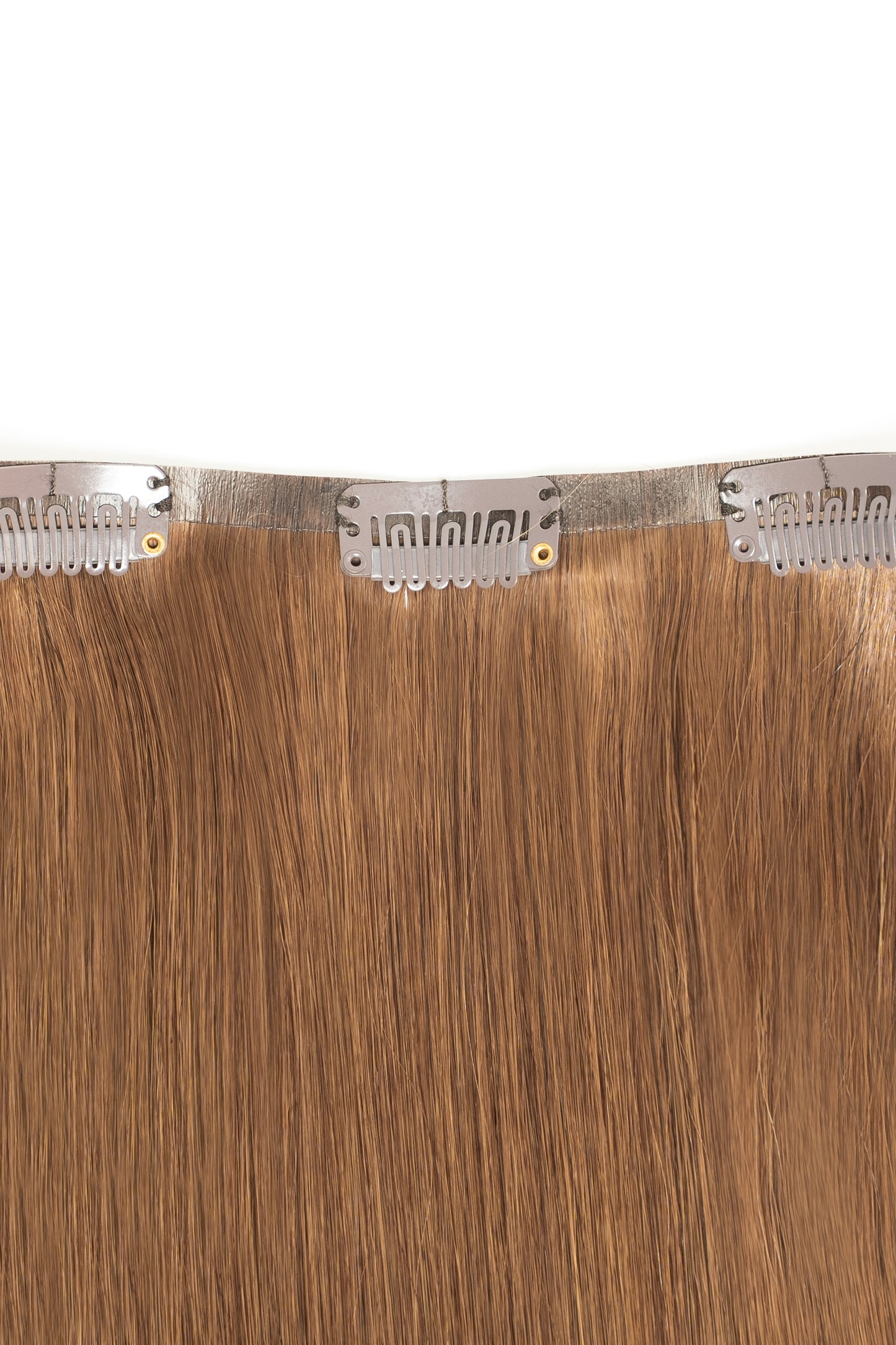 Warm brown clip-in extensions from 1010 Extensions with rich undertones and shine