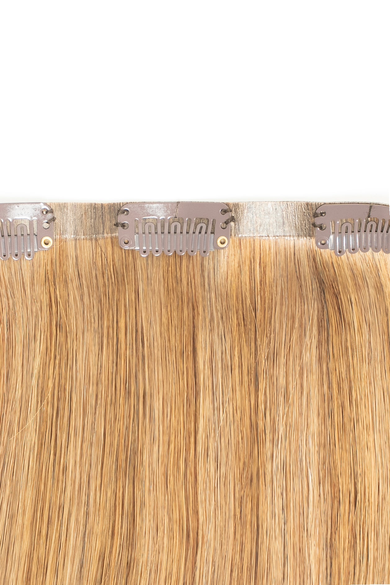1010 Extensions light brown Remy clip-ins designed for subtle volume and length