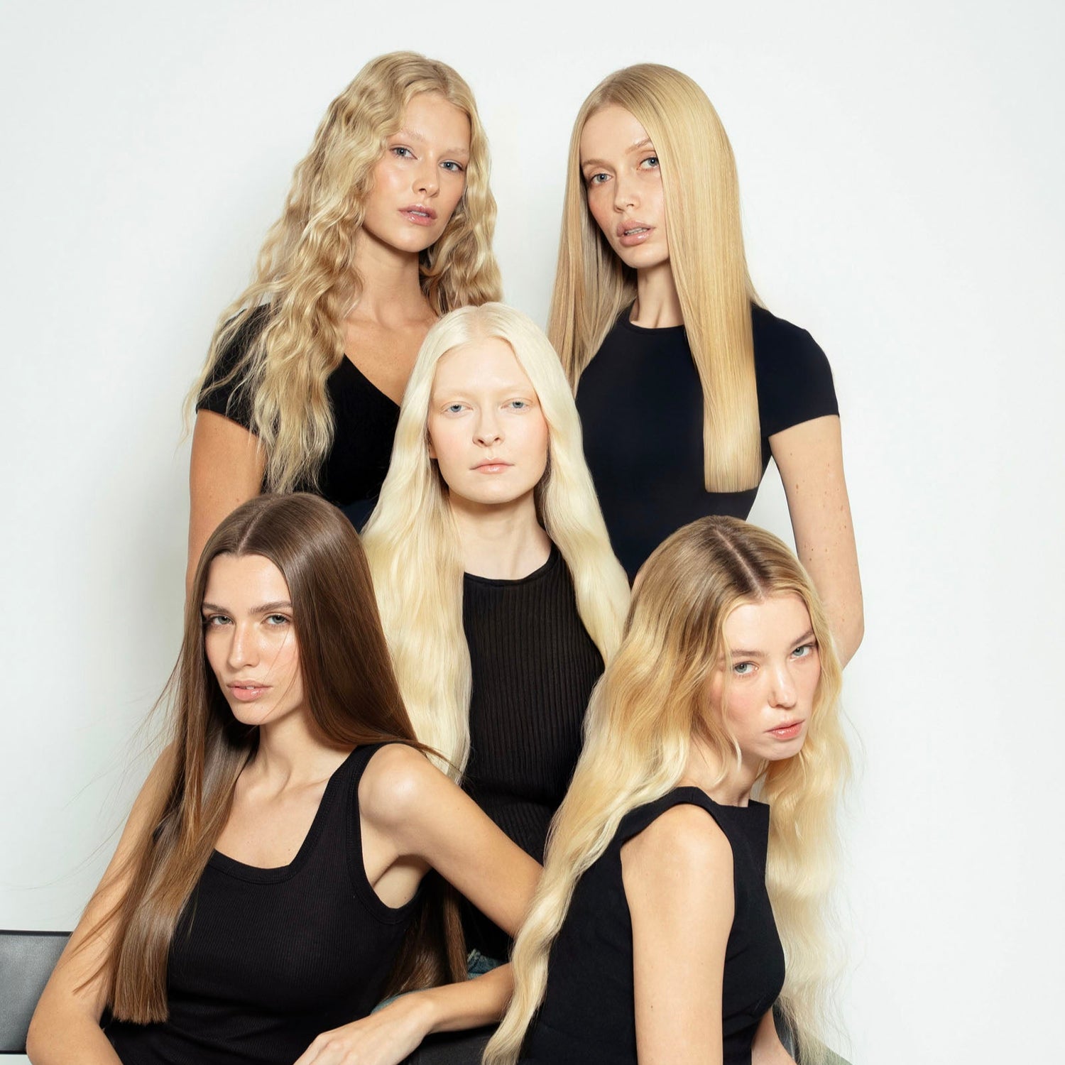 Fashionable group showcasing the versatility of 1010 Extensions' hair colours—rich brunettes, platinum blondes, and subtle balayage tones