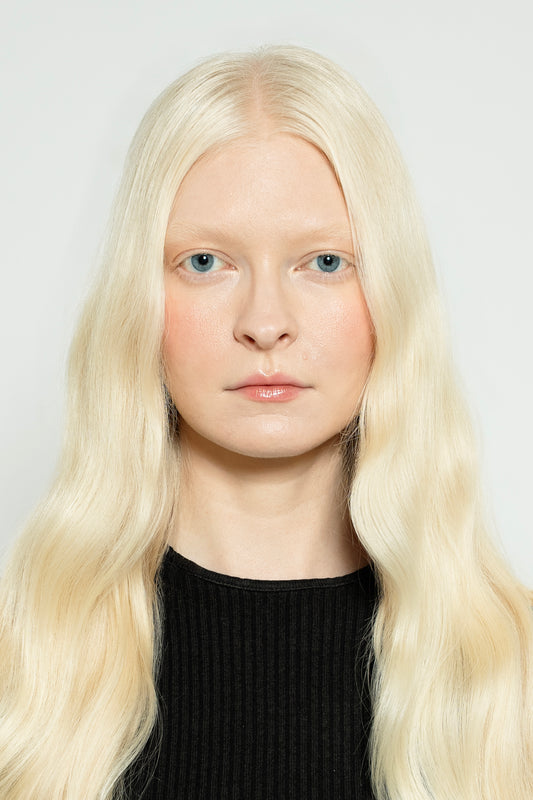 Bright blonde clip-in hair extensions from 1010 Extensions for instant volume and length