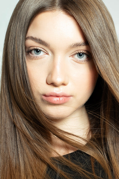 Soft, natural-looking clip-in extensions in warm brown shade for everyday wear