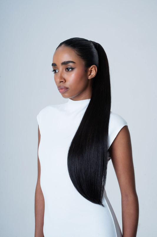 Elegant mid-height ponytail in dark brown, created using 1010 Extensions Remy human hair
