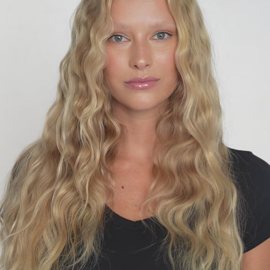 Warm blonde clip-in hair extensions from 1010 Extensions for golden, sun-kissed length