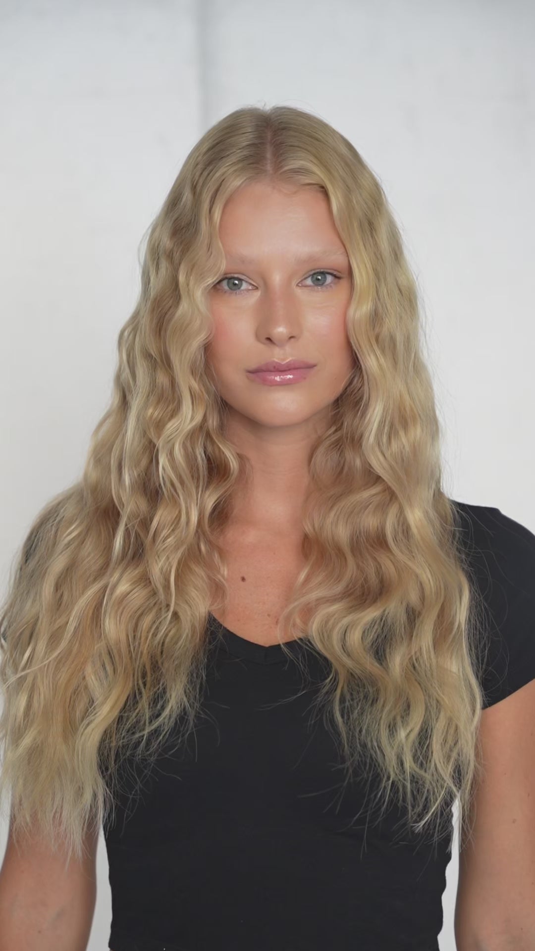 Warm blonde clip-in hair extensions from 1010 Extensions for golden, sun-kissed length