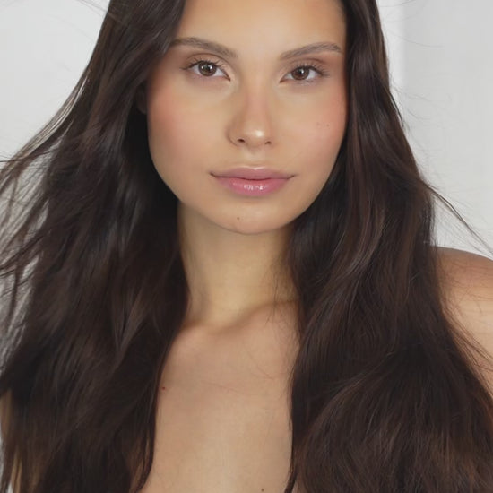1010 Extensions dark brown clip-ins styled straight for a sleek, full finish